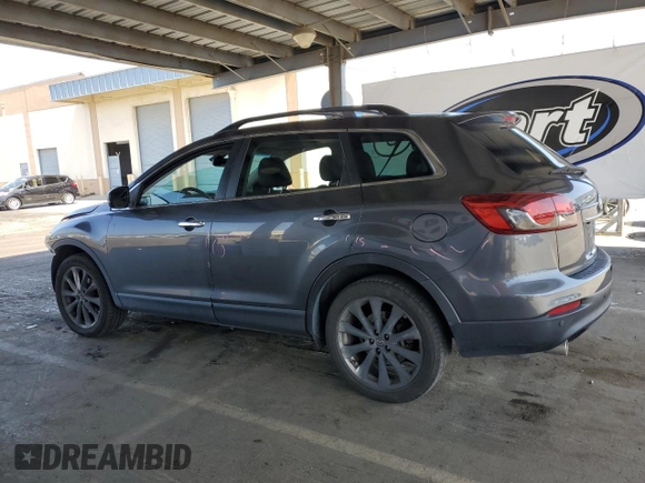 2015 Mazda CX-9 Grand Touring z VIN JM3TB3DV2F0456130, wystawiony jako Copart lot #55787935 z przebiegiem 120 888 mil mil oraz Szkoda całkowita • Salvage title. Historia ofert i sprzedaży dostępna na DreamBid. Obrazek 2.