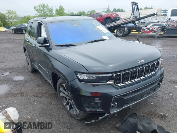 2023 Jeep Grand Cherokee Overland with VIN 1C4RJHDG2PC516797, listed as a IAAI auction lot 42026063 with 25,808 mi miles and . Bid and sale history available at DreamBid. Image 1.