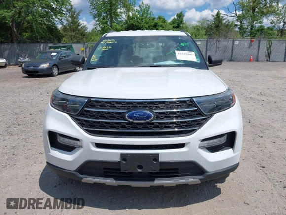 2021 Ford Explorer XLT z VIN 1FMSK8DH5MGA54632, wystawiony jako IAAI lot #42229993 z przebiegiem 34 304 mil mil oraz . Historia ofert i sprzedaży dostępna na DreamBid. Obrazek 12.