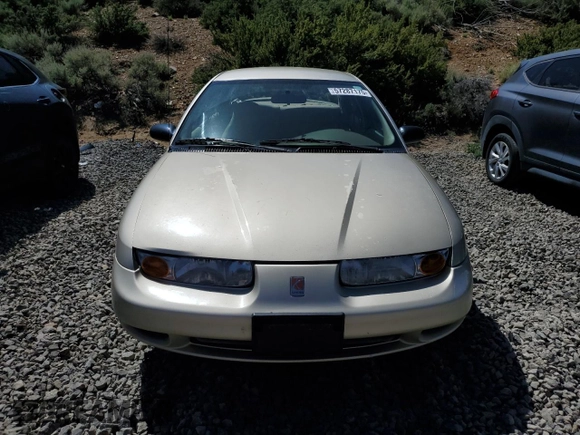 2002 Saturn SL z VIN 1G8ZH54852Z214519, wystawiony jako Copart lot #57287175 z przebiegiem 176 175 mil mil oraz Szkoda całkowita • Salvage title. Historia ofert i sprzedaży dostępna na DreamBid. Obrazek 5.