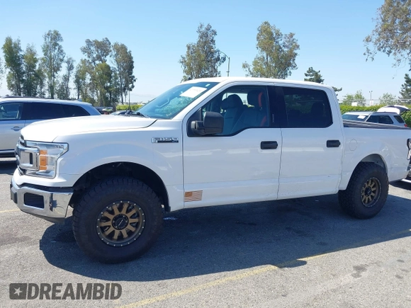 2019 Ford F-150 XL with VIN 1FTEW1C53KKC40961, listed as a IAAI auction lot 41993421 with 63,126 mi miles and . Bid and sale history available at DreamBid. Image 14.