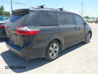 2015 Toyota Sienna LE AAS with VIN 5TDKK3DC7FS687525, listed as a IAAI auction lot 42250458 with 140,429 mi miles and . Bid and sale history available at DreamBid. Image 4.