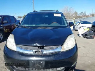 2009 Toyota Sienna XLE with VIN 5TDZK22C69S273555, listed as a IAAI auction lot 41276221 with 129,160 mi miles and . Bid and sale history available at DreamBid. Image 12.