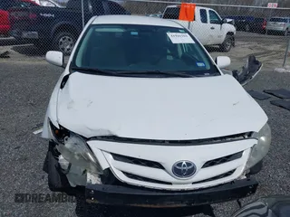 2012 Toyota Corolla L with VIN 2T1BU4EE5CC866490, listed as a IAAI auction lot 41941161 with 99,901 mi miles. Bid and sale history available at carsss.com. Image 13.