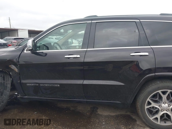 2021 Jeep Grand Cherokee Overland z VIN 1C4RJFCG4MC621214, wystawiony jako IAAI lot #42188010 z przebiegiem 15 559 mil mil oraz . Historia ofert i sprzedaży dostępna na DreamBid. Obrazek 15.