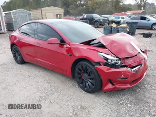 2022 Tesla Model 3 Performance with VIN 5YJ3E1ECXNF326159, listed as a IAAI auction lot 40796573 with 43,512 mi miles. Bid and sale history available at carsss.com. Image 1.