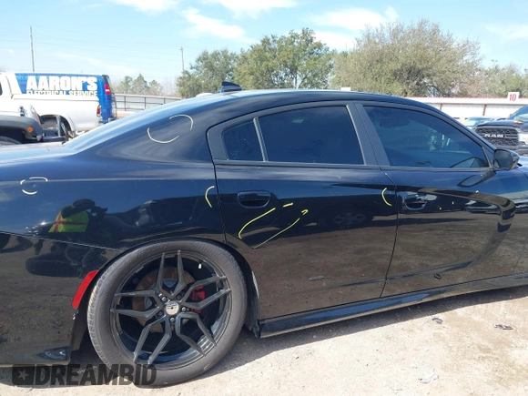 2019 Dodge Charger R/T with VIN 2C3CDXCT2KH575297, listed as a IAAI auction lot 41661339 with 119,854 mi miles and . Bid and sale history available at DreamBid. Image 19.