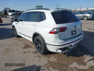 2024 Volkswagen Tiguan SE R-Line Black with VIN 3VVCB7AX0RM099863, listed as a IAAI auction lot 41851884 with 14,091 mi miles and . Bid and sale history available at DreamBid. Image 3.