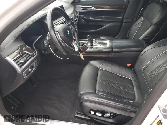 2020 BMW 7 Series 740i with VIN WBA7T2C02LCE43427, listed as a Copart auction lot 84253634 with 61,180 mi miles and Salvage Title. Bid and sale history available at carsss.com. Image 7.