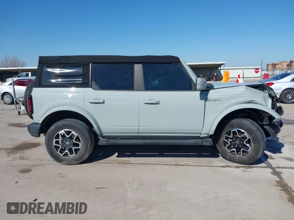 2021 Ford Bronco with VIN 1FMDE5BHXMLB06040, listed as a IAAI auction lot 41490539 with 57,915 mi miles. Bid and sale history available at carsss.com. Image 13.
