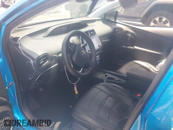 2021 Toyota Prius L Eco with VIN JTDKAMFUXM3134462, listed as a IAAI auction lot 42450931 with 89,239 mi miles and . Bid and sale history available at DreamBid. Image 5.