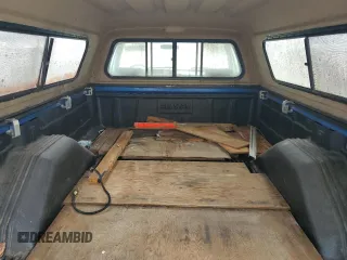 1991 Dodge D/W 250 z VIN 1B7KM26C5MS319916, wystawiony jako Copart lot #57512115 z przebiegiem 77 179 mil mil oraz Tytuł czysty. Historia ofert i sprzedaży dostępna na DreamBid. Obrazek 10.