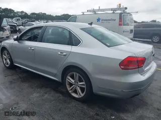 2013 Volkswagen Passat SEL Premium with VIN 1VWCM7A30DC001492, listed as a IAAI auction lot 41981749 with 1 mi miles. Bid and sale history available at carsss.com. Image 3.