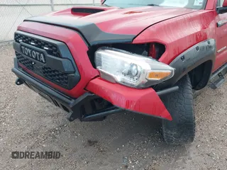 2019 Toyota Tacoma SR5 with VIN 3TMAZ5CN1KM092783, listed as a IAAI auction lot 42181784 with 86,272 mi miles and . Bid and sale history available at DreamBid. Image 6.