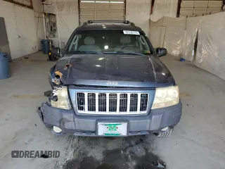 2004 Jeep Grand Cherokee Laredo z VIN 1J4GW48S14C338788, wystawiony jako Copart lot #53136715 z przebiegiem 150 352 mil mil oraz Szkoda całkowita • Salvage title. Historia ofert i sprzedaży dostępna na DreamBid. Obrazek 5.