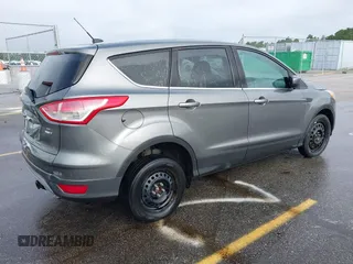 2014 Ford Escape SE with VIN 1FMCU9GX1EUD05513, listed as a IAAI auction lot 42651209 with 110,166 mi miles and . Bid and sale history available at DreamBid. Image 4.