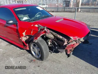 2001 Ford Mustang Standard z VIN 1FAFP40441F122154, wystawiony jako IAAI lot #41866131 z przebiegiem 214 865 mil mil oraz . Historia ofert i sprzedaży dostępna na DreamBid. Obrazek 6.