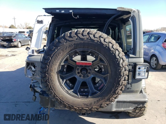 2023 Jeep Wrangler Sport S with VIN 1C4HJXDG3PW602849, listed as a Copart auction lot 46718365 with 24,308 mi miles and Salvage Title. Bid and sale history available at DreamBid. Image 6.