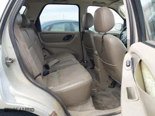 2003 Ford Escape XLT Popular 2 with VIN 1FMYU93183KB80977, listed as a IAAI auction lot 41657209 with 1 mi miles. Bid and sale history available at carsss.com. Image 8.