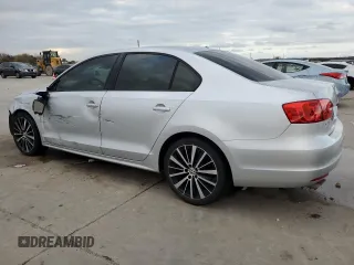 2014 Volkswagen Jetta Sedan S with VIN 3VW2K7AJ0EM311044, listed as a Copart auction lot 85212324 with 128,521 mi miles and Salvage Title. Bid and sale history available at carsss.com. Image 2.