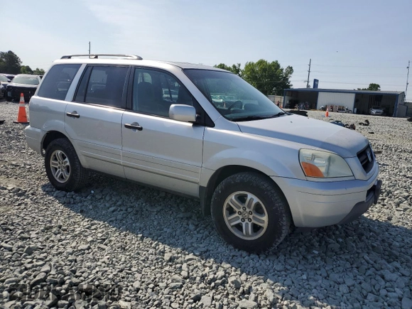 2005 Honda Pilot EX-L with VIN 2HKYF18505H500452, listed as a Copart auction lot 57552535 with 282,733 mi miles and Salvage title. Bid and sale history available at DreamBid. Image 4.