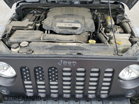 2016 Jeep Wrangler Unlimited Sport z VIN 1C4BJWDG5GL179046, wystawiony jako Copart lot #52989725 z przebiegiem 129 051 mil mil oraz Szkoda całkowita • Salvage title. Historia ofert i sprzedaży dostępna na DreamBid. Obrazek 11.