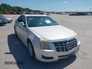 2012 Cadillac CTS Luxury with VIN 1G6DF5E50C0131857, listed as a IAAI auction lot 42610389 with 85,896 mi miles and . Bid and sale history available at DreamBid. Image 1.