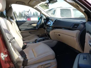 2016 Honda Pilot Touring with VIN 5FNYF6H99GB094933, listed as a IAAI auction lot 41967730 with 98,841 mi miles. Bid and sale history available at carsss.com. Image 5.