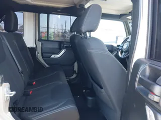 2017 Jeep Wrangler Unlimited Sahara with VIN 1C4BJWEG1HL746854, listed as a IAAI auction lot 41948127 with 97,730 mi miles. Bid and sale history available at carsss.com. Image 8.