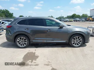 2016 Mazda CX-9 Signature with VIN JM3TCBEY9G0100579, listed as a IAAI auction lot 42282293 with 142,700 mi miles and . Bid and sale history available at DreamBid. Image 13.