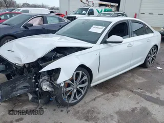 2014 Audi A6 Prestige z VIN WAUHMAFC6EN098487, wystawiony jako IAAI lot #41908034 z przebiegiem 146 298 mil mil oraz . Historia ofert i sprzedaży dostępna na DreamBid. Obrazek 17.