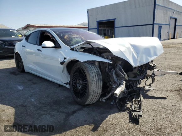2021 Tesla Model S Long Range with VIN 5YJSA1E59MF441715, listed as a Copart auction lot 56667755 with Not provided miles and Salvage title. Bid and sale history available at DreamBid. Image 4.