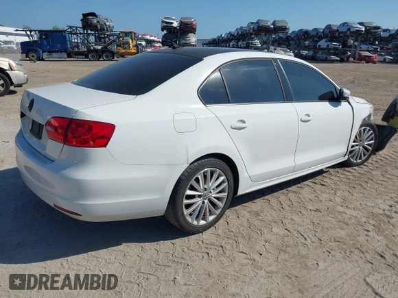 2013 Volkswagen Jetta TDI w/Premium/Nav with VIN 3VWLL7AJXDM392313, listed as a IAAI auction lot 42370151 with 98,618 mi miles and . Bid and sale history available at DreamBid. Image 4.