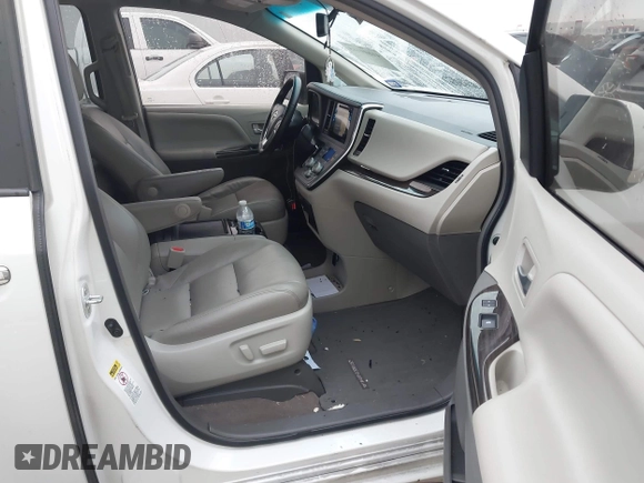2016 Toyota Sienna XLE with VIN 5TDYK3DC2GS726677, listed as a IAAI auction lot 41609165 with 144,858 mi miles. Bid and sale history available at carsss.com. Image 5.