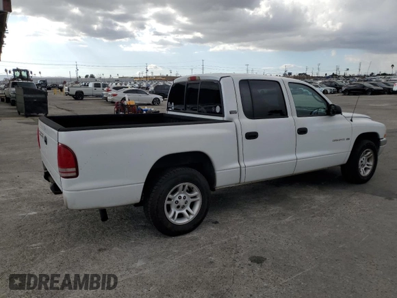 2001 Dodge Dakota Sport with VIN 1B7GL2AN21S131366, listed as a Copart auction lot 81263154 with 272,938 mi miles and Salvage Title. Bid and sale history available at DreamBid. Image 3.