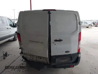 2019 Ford Transit with VIN 1FTYE1ZM2KKB46391, listed as a IAAI auction lot 41362328 with 128,327 mi miles and . Bid and sale history available at carsss.com. Image 16.