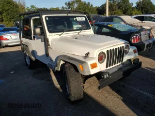 2006 Jeep Wrangler Sport Right Hand Drive with VIN 1J4F449SX6P733578, listed as a Copart auction lot 75113494 with 0 mi miles and Salvage Title. Bid and sale history available at carsss.com. Image 4.