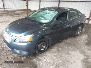 2015 Nissan Sentra SR with VIN 3N1AB7AP2FY275664, listed as a IAAI auction lot 42084827 with 217,934 mi miles and . Bid and sale history available at DreamBid. Image 2.