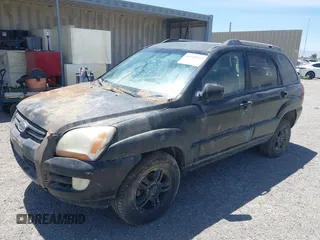 2005 Kia Sportage LX with VIN KNDJF723057061348, listed as a IAAI auction lot 42110933 with 183,490 mi miles and . Bid and sale history available at carsss.com. Image 2.