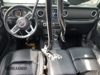 2020 Jeep Wrangler Unlimited Sahara with VIN 1C4HJXEG7LW297722, listed as a Copart auction lot 55295025 with 69,064 mi miles and Salvage title. Bid and sale history available at DreamBid. Image 8.