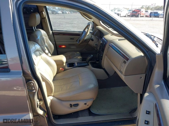 2002 Jeep Grand Cherokee Limited with VIN 1J8GW58N12C268589, listed as a IAAI auction lot 41748099 with 146,673 mi miles. Bid and sale history available at carsss.com. Image 5.