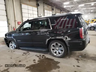 2016 GMC Yukon Denali with VIN 1GKS2CKJ8GR402482, listed as a Copart auction lot 69753434 with 160,816 mi miles and Salvage Title. Bid and sale history available at carsss.com. Image 2.