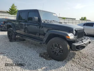 2023 Jeep Gladiator Sport S with VIN 1C6HJTAG7PL517812, listed as a Copart auction lot 60200015 with 38,793 mi miles and Clean title. Bid and sale history available at DreamBid. Image 4.