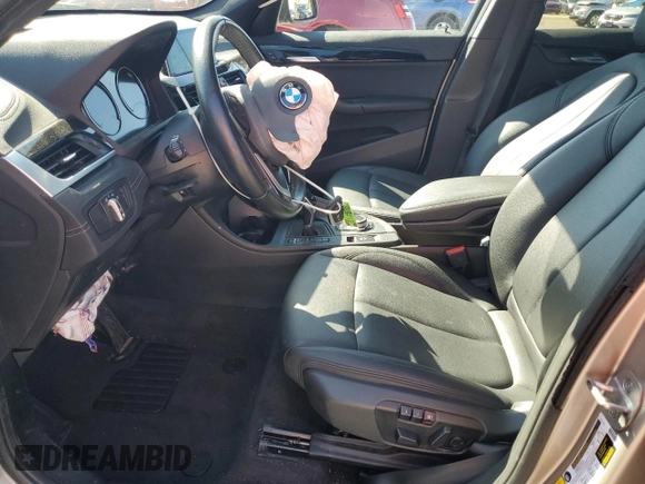 2021 BMW X1 sDrive28i with VIN WBXJG7C0XM5S33884, listed as a Copart auction lot 48413405 with 89,698 mi miles and Salvage Title. Bid and sale history available at DreamBid. Image 7.