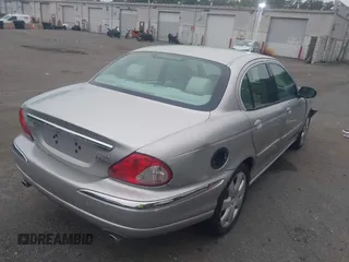 2004 Jaguar X-Type z VIN SAJEA51CX4WE01300, wystawiony jako IAAI lot #42514993 z przebiegiem 95 525 mil mil oraz . Historia ofert i sprzedaży dostępna na DreamBid. Obrazek 4.