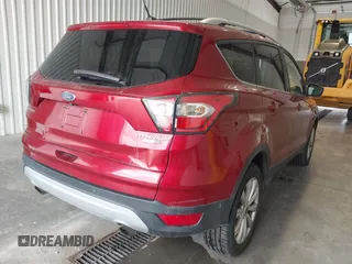 2017 Ford Escape Titanium with VIN 1FMCU9J91HUA32264, listed as a IAAI auction lot 42050273 with 201,128 mi miles. Bid and sale history available at carsss.com. Image 4.