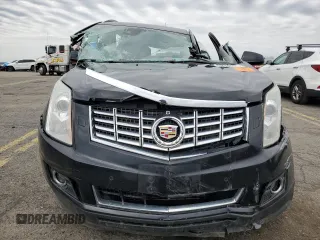 2014 Cadillac SRX Premium Collection z VIN 3GYFNGE31ES688270, wystawiony jako Copart lot #52795245 z przebiegiem 134 103 mil mil oraz Szkoda całkowita • Salvage title. Historia ofert i sprzedaży dostępna na DreamBid. Obrazek 5.