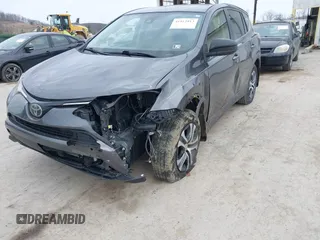 2018 Toyota RAV4 LE with VIN JTMBFREV4JJ742428, listed as a IAAI auction lot 41912813 with 114,159 mi miles. Bid and sale history available at carsss.com. Image 6.
