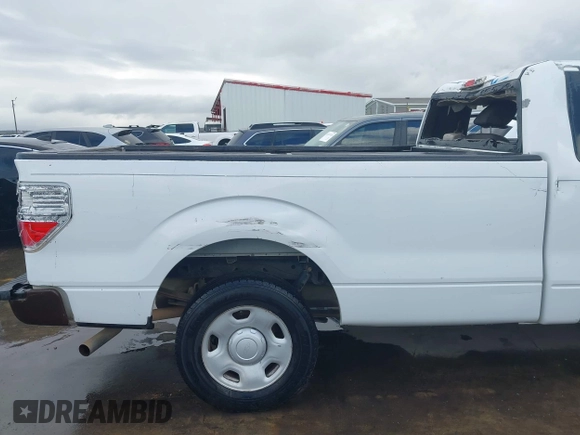 2009 Ford F-150 XL with VIN 1FTRF12W49KB49249, listed as a IAAI auction lot 41113915 with 193,285 mi miles and . Bid and sale history available at DreamBid. Image 14.