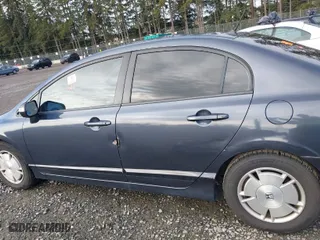 2009 Honda Civic Hybrid with VIN JHMFA36209S008939, listed as a IAAI auction lot 41798952 with 163,650 mi miles. Bid and sale history available at carsss.com. Image 14.